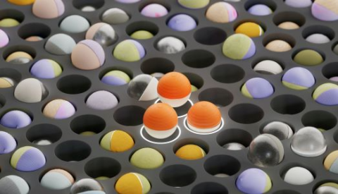 different coloured balls in grey holes