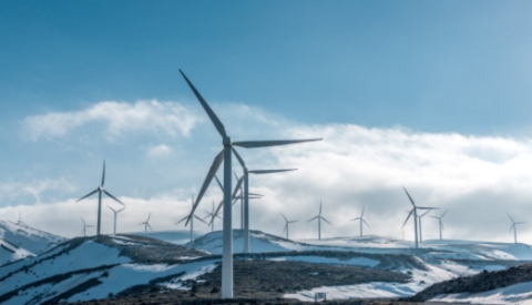wind turbines landscape with snow and clouds