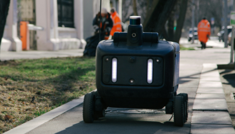 black autonomous delivery vehicle